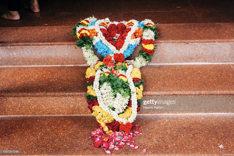 Floral garlands on steps of a Hindu temple