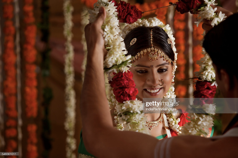 Indian bride and groom during wedding ceremony